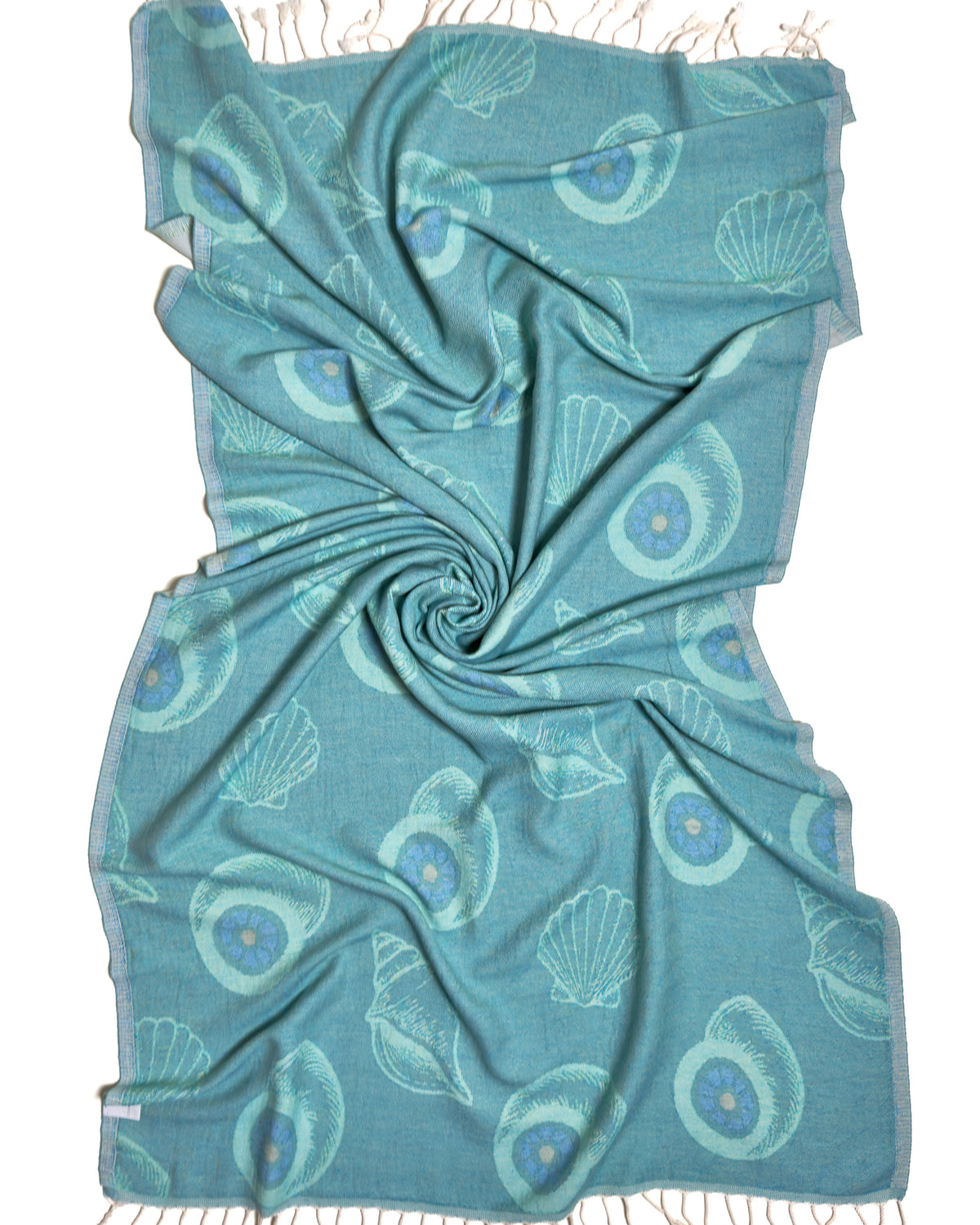 Back view of the twisted Charm organic Turkish cotton beach towel with California inspired jacquard design. Iconic Turkish Evil Eye, Turquoise.