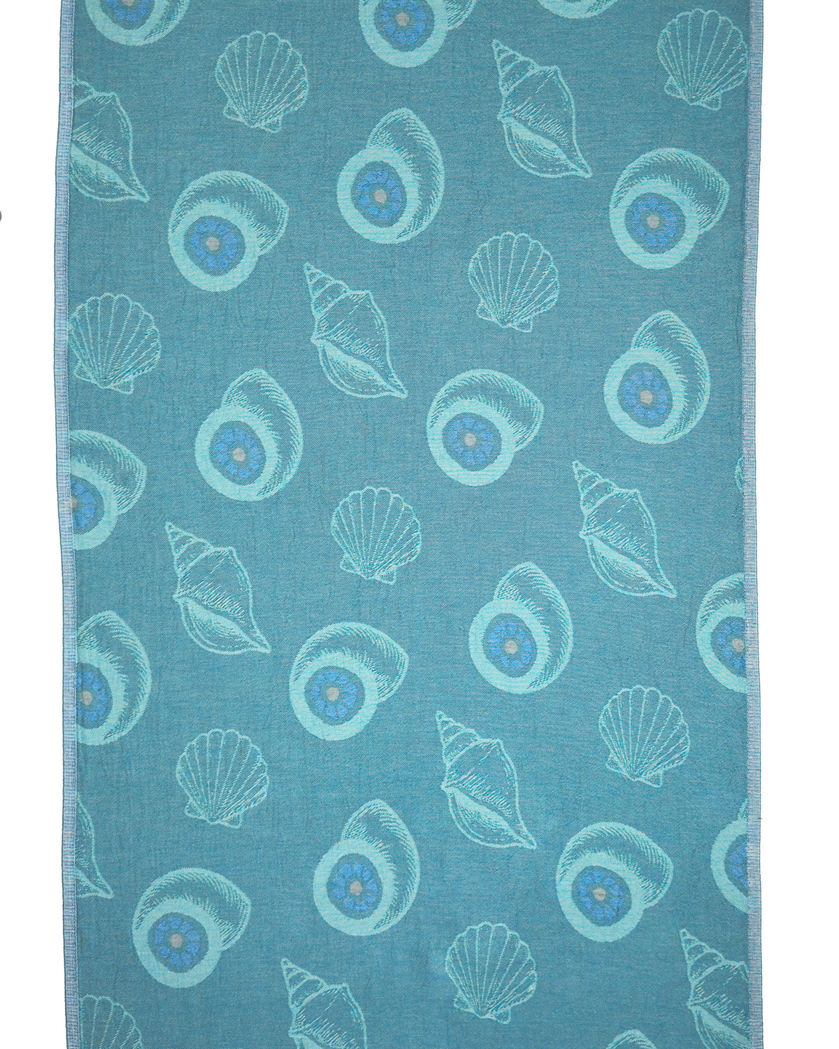 Back view of the reversible Charm organic Turkish cotton beach towel. Iconic Turkish Evil Eye, Turquoise.