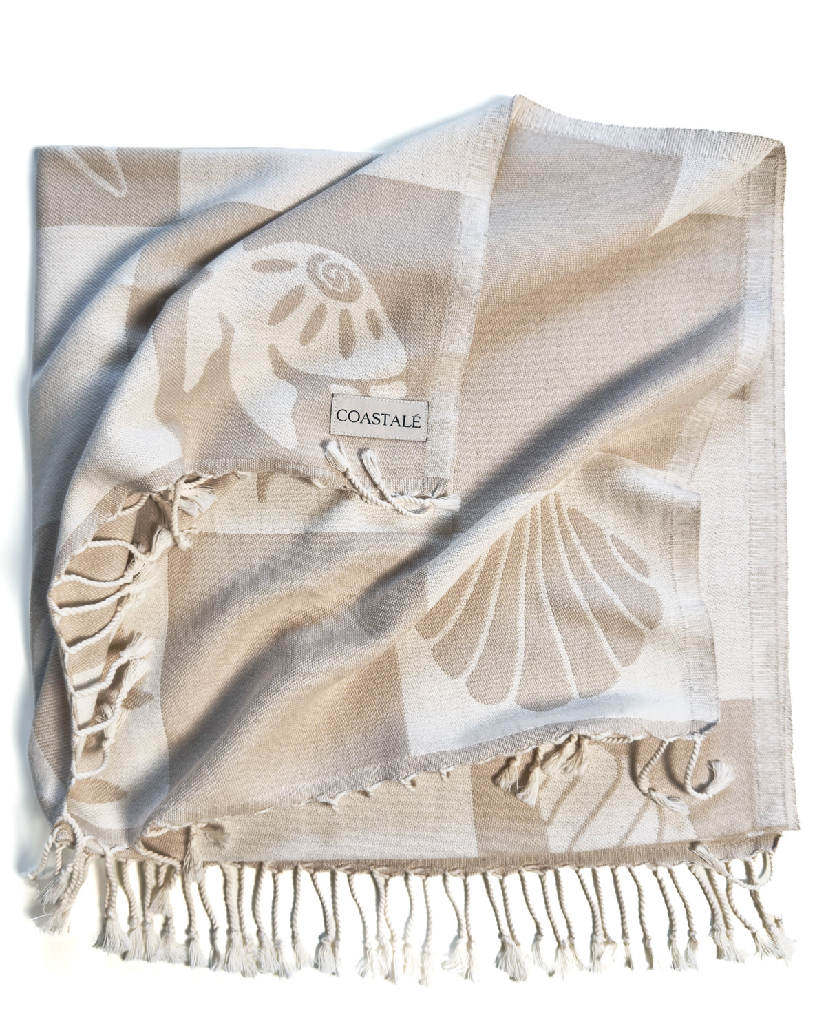 Folded and twisted Coastline organic Turkish cotton beach towel