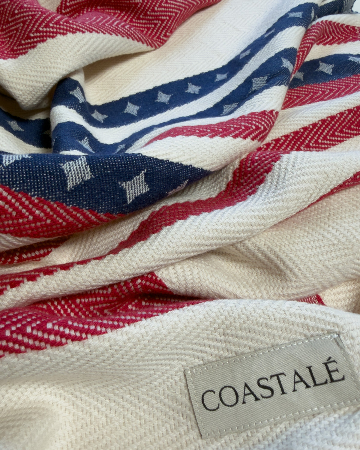 COASTALÉ label on the Old Glory organic Turkish cotton beach towel, 4th July, American Flag design