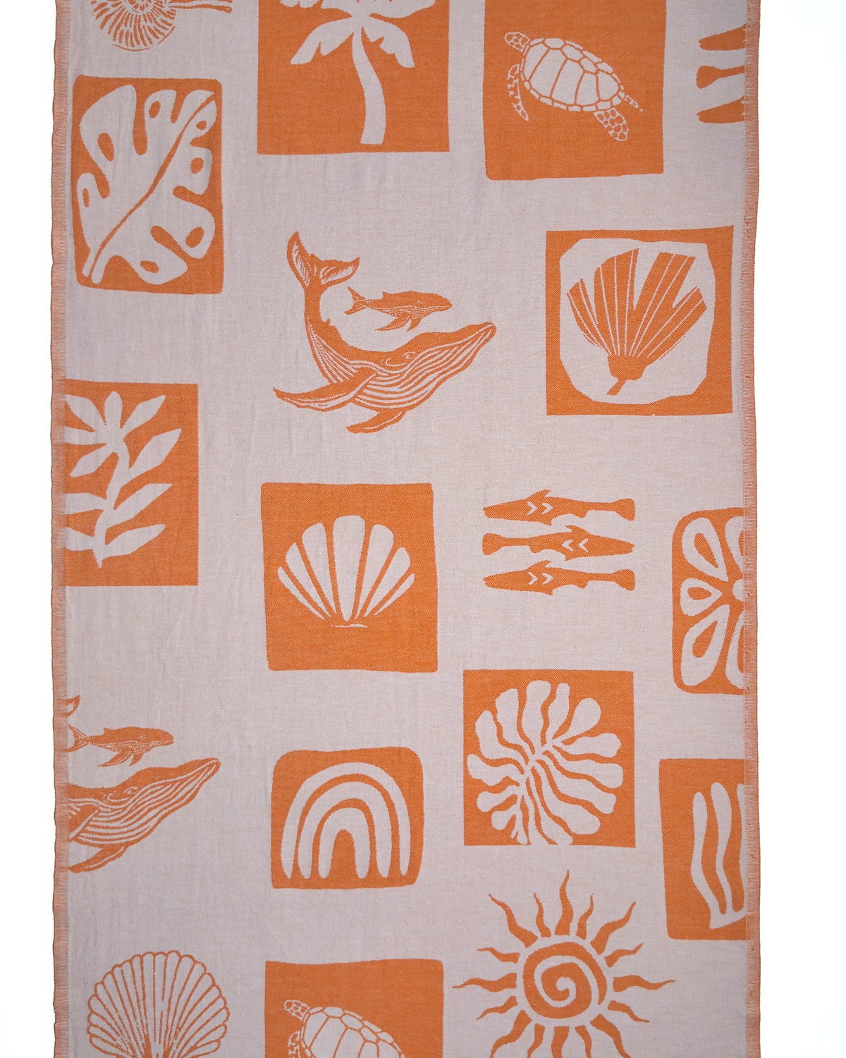 Front view of the Postcards orange organic Turkish cotton beach towel