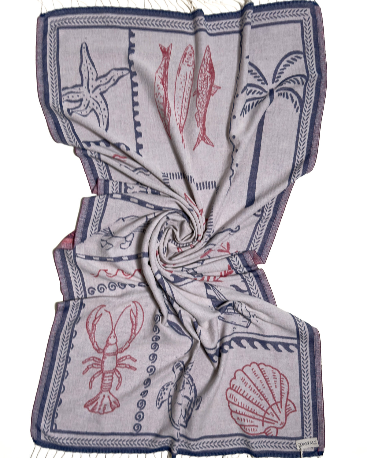 Front view of the twisted Shore Treasures navy organic Turkish cotton beach towel with California inspired jacquard design