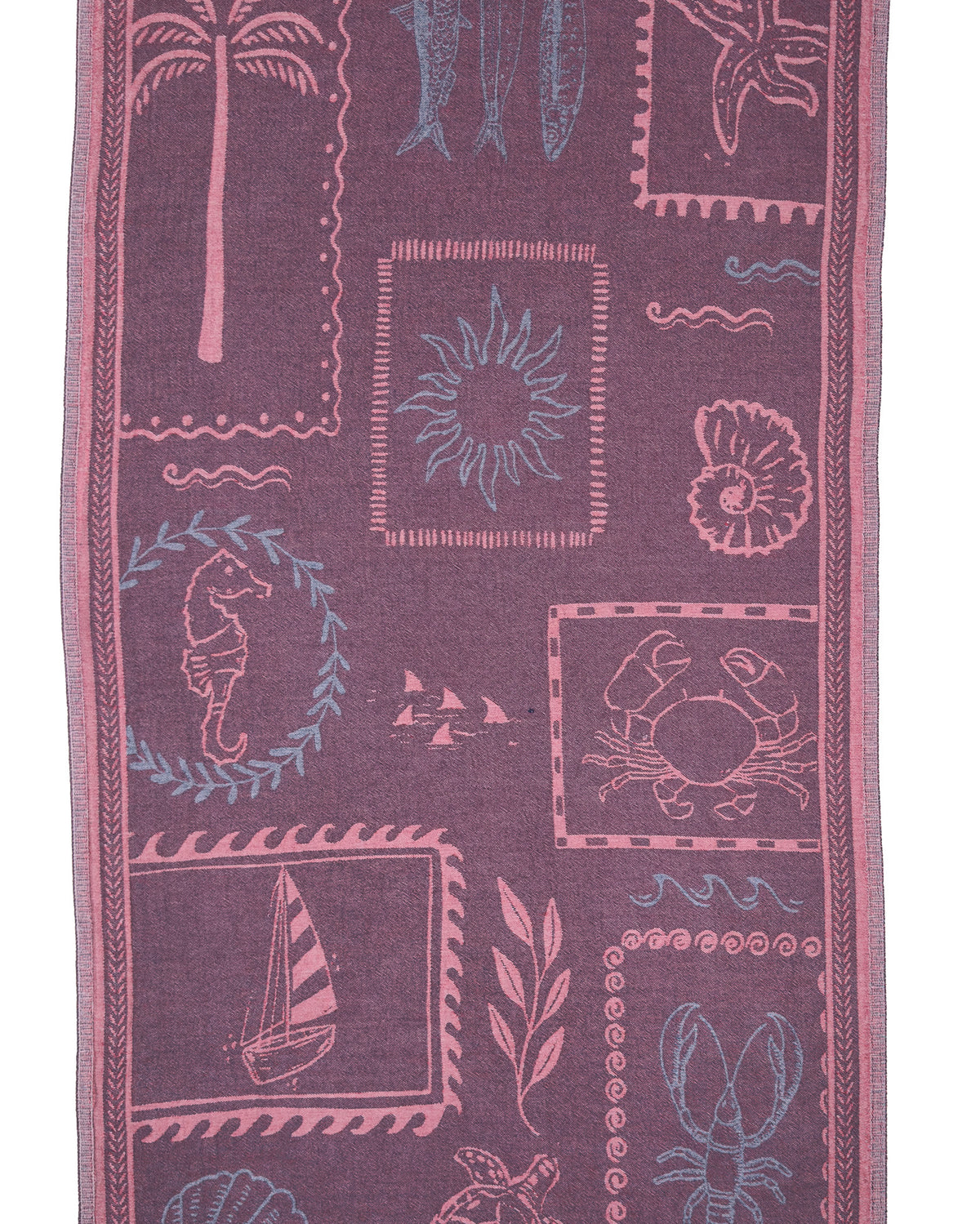 Back view of the reversible Shore Treasures navy organic Turkish cotton beach towel