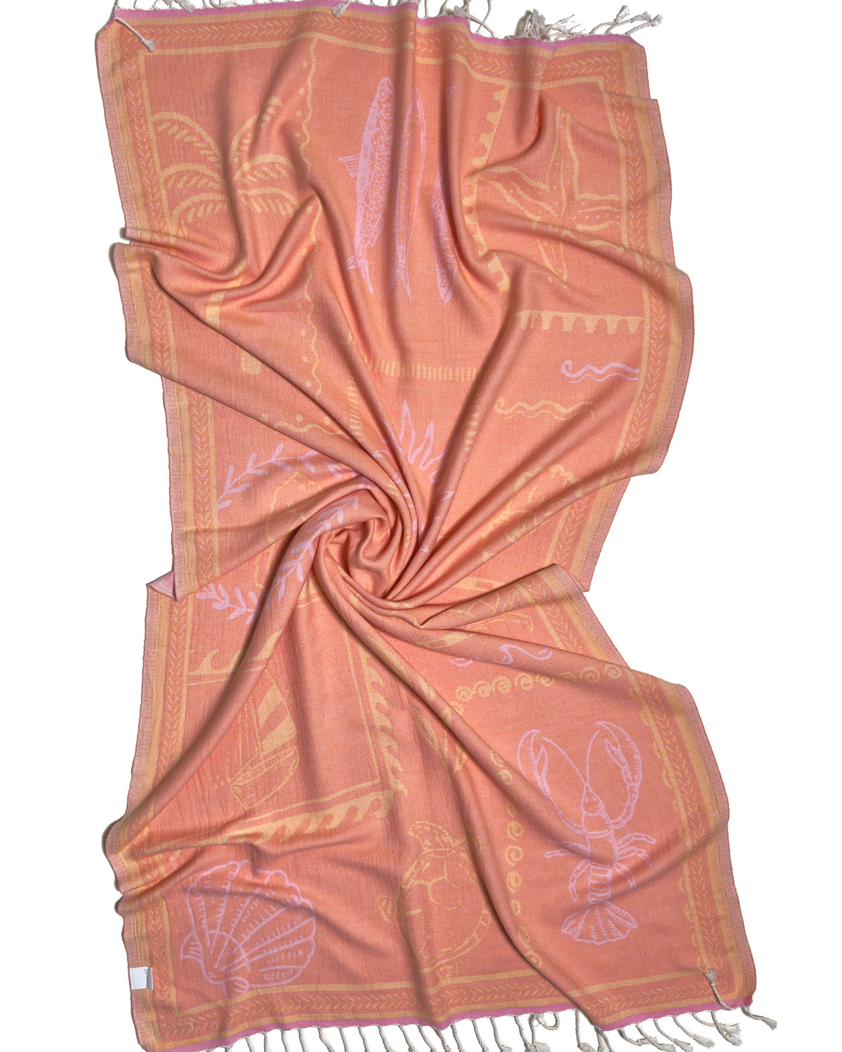 Back view of the twisted Shore Treasures pink organic Turkish cotton beach towel with California inspired jacquard design