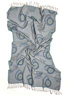 Front view of the twisted Charm organic Turkish cotton beach towel with California inspired jacquard design. Iconic Turkish Evil Eye, Turquoise.