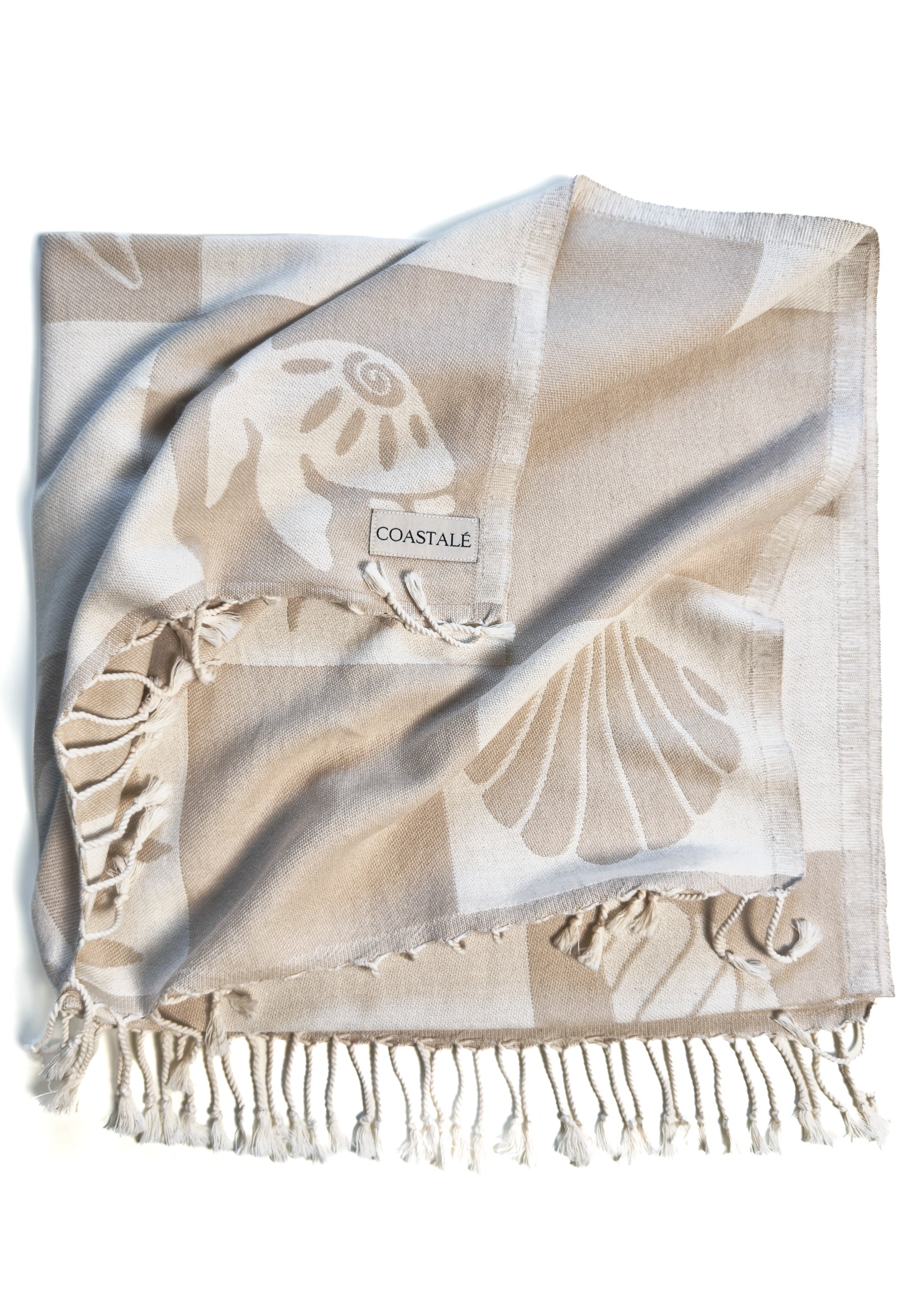 Folded and twisted Coastline organic Turkish cotton beach towel