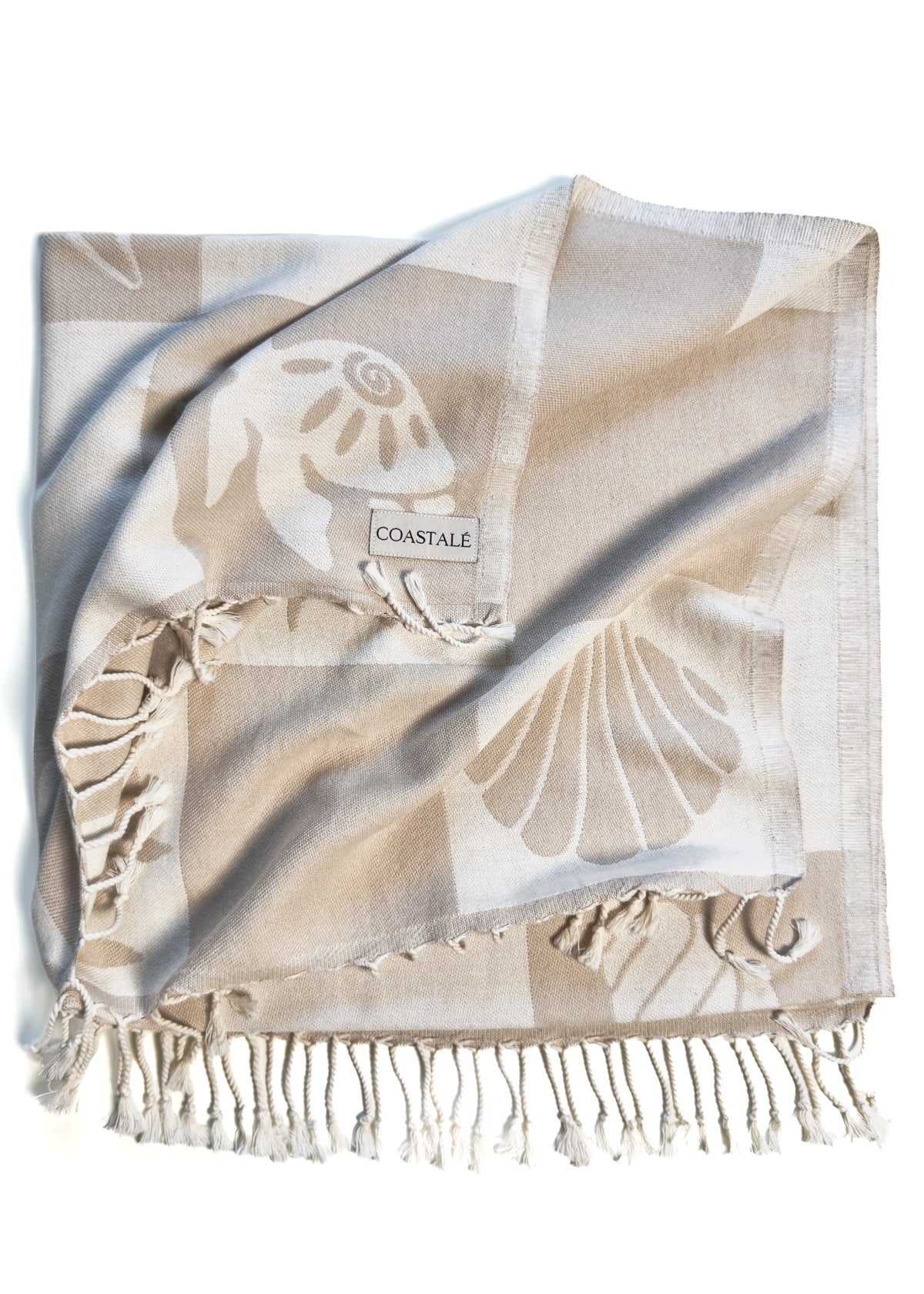 Folded and twisted Coastline organic Turkish cotton beach towel