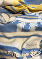 Front view of the twisted Horizon organic Turkish cotton beach towel with California inspired jacquard design