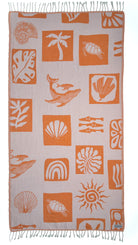 Front view of the Postcards orange organic Turkish cotton beach towel