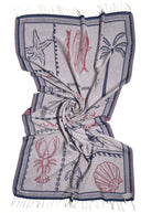 Front view of the twisted Shore Treasures navy organic Turkish cotton beach towel with California inspired jacquard design