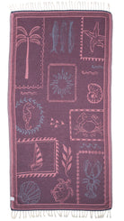 Back view of the reversible Shore Treasures navy organic Turkish cotton beach towel

