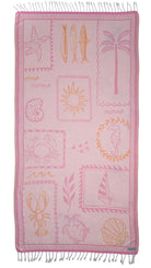 Front view of the Shore Treasures pink organic Turkish cotton beach towel