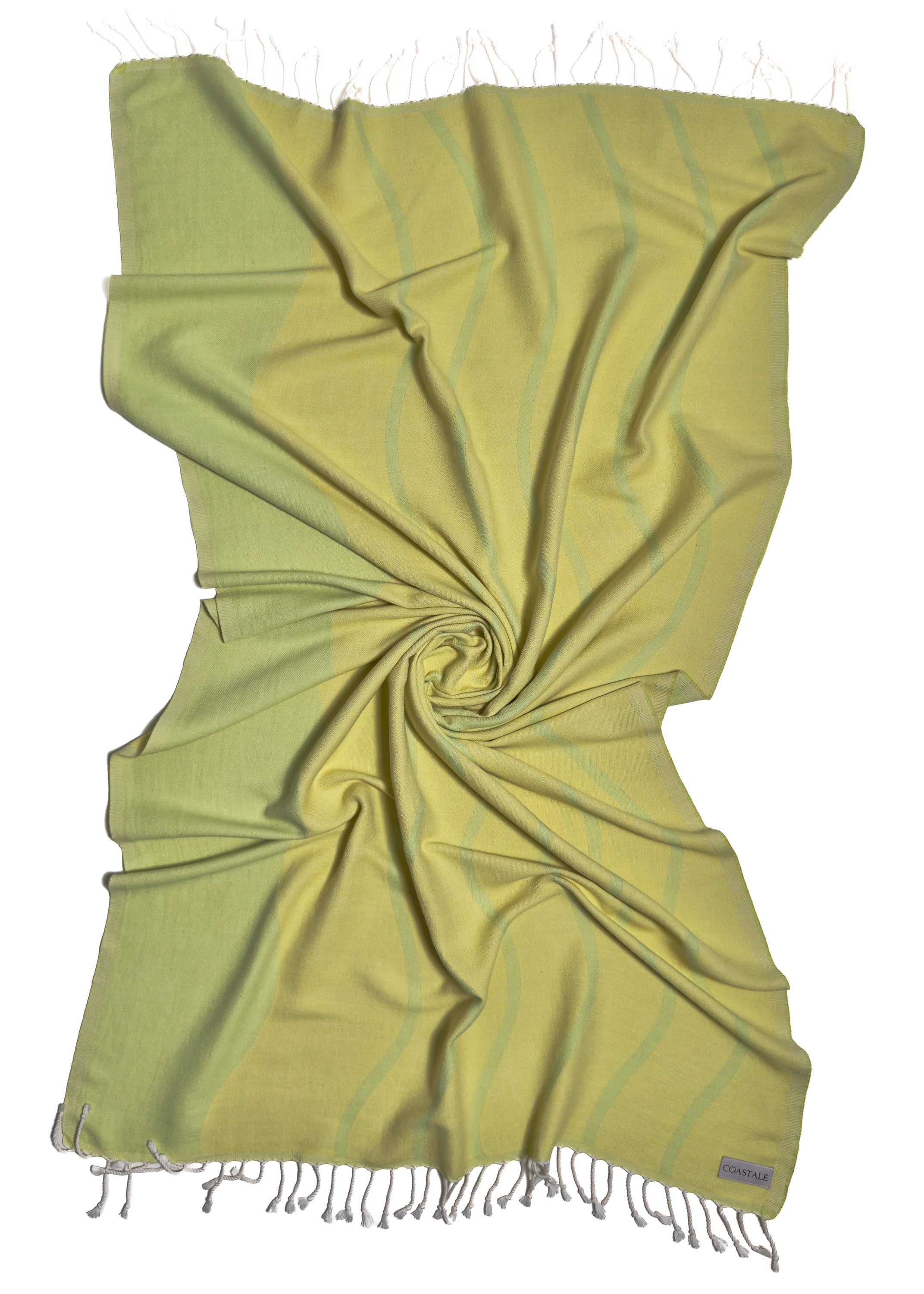 Front view of the twisted Swell Lemon organic Turkish cotton beach towel with California inspired jacquard design